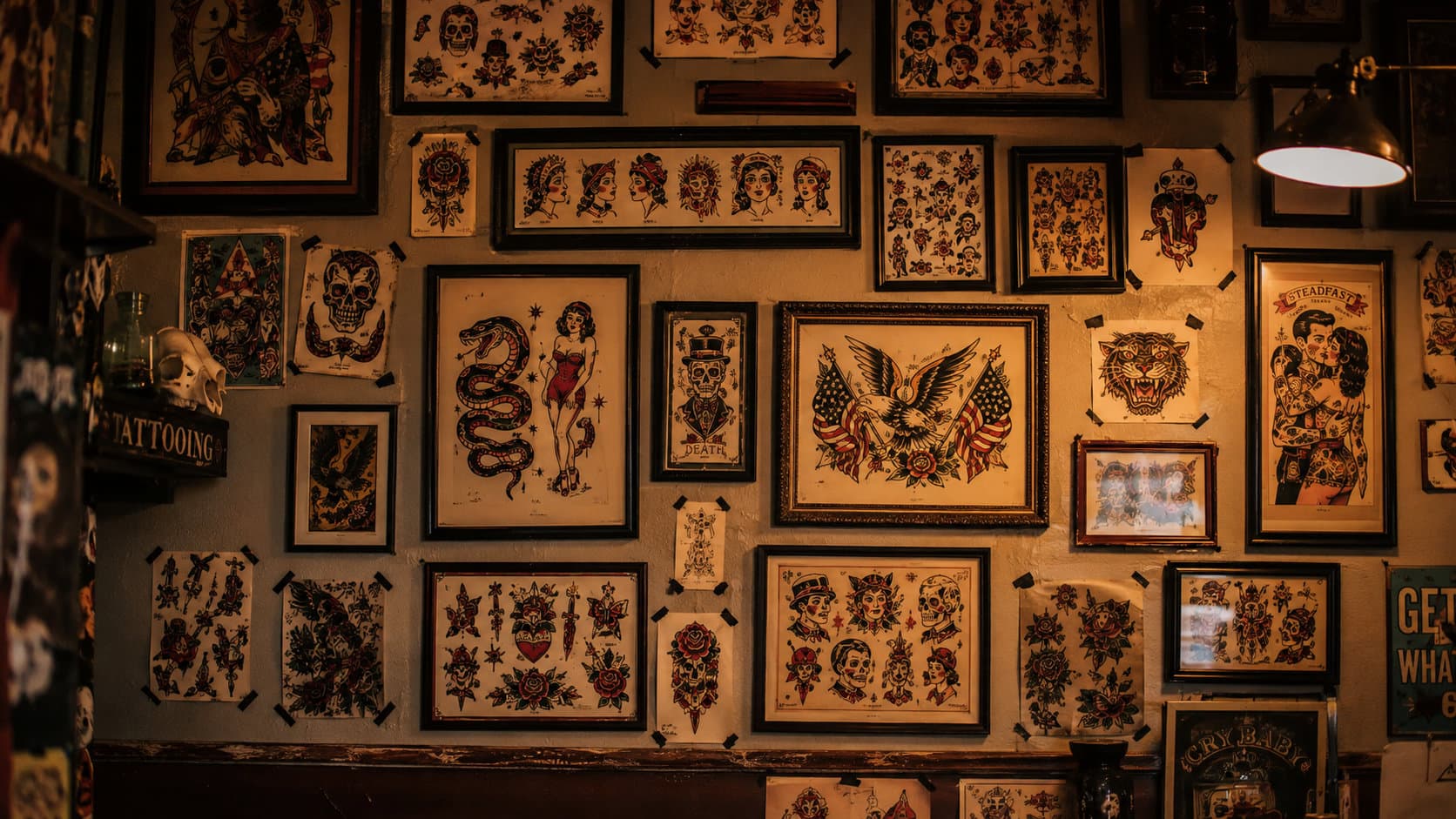 A studio wall of framed flash sheets in soft depth of field.